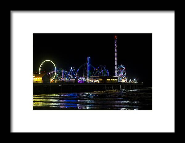 Galveston Island Historic Pleasure Pier Framed Print featuring the photograph Galveston Island Historic Pleasure Pier at Night by Andy Myatt