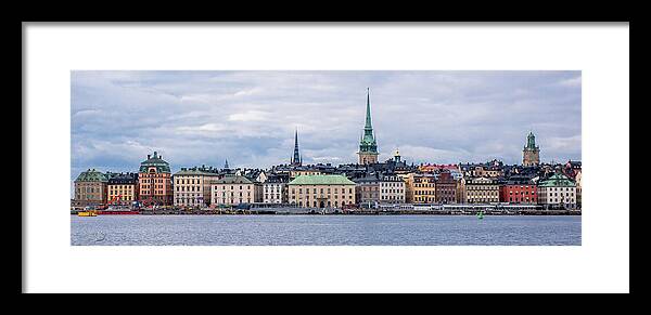 Gamla Stan Stockholm's Entrance By The Sea Framed Print featuring the photograph Gamla Stan Stockholm's entrance by the sea by Torbjorn Swenelius