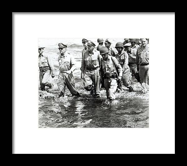 Macarthur Framed Print featuring the photograph General Douglas MacArthur wades ashore at Leyte on his return to the Philippines by American School