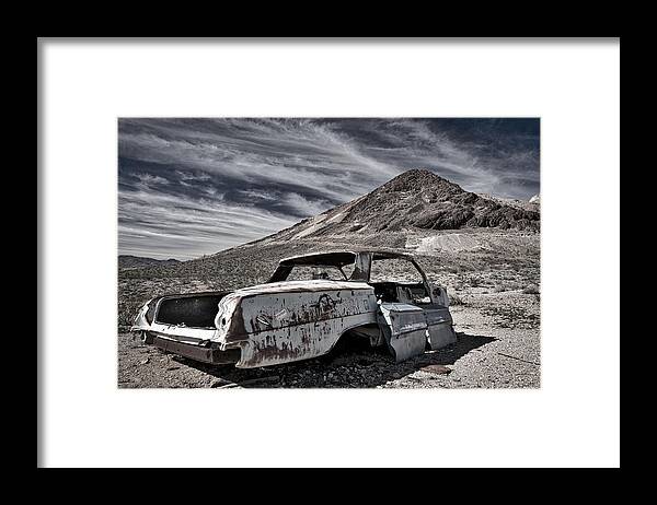 Nevada Framed Print featuring the photograph Ghost Town Junked Car by Stuart Litoff