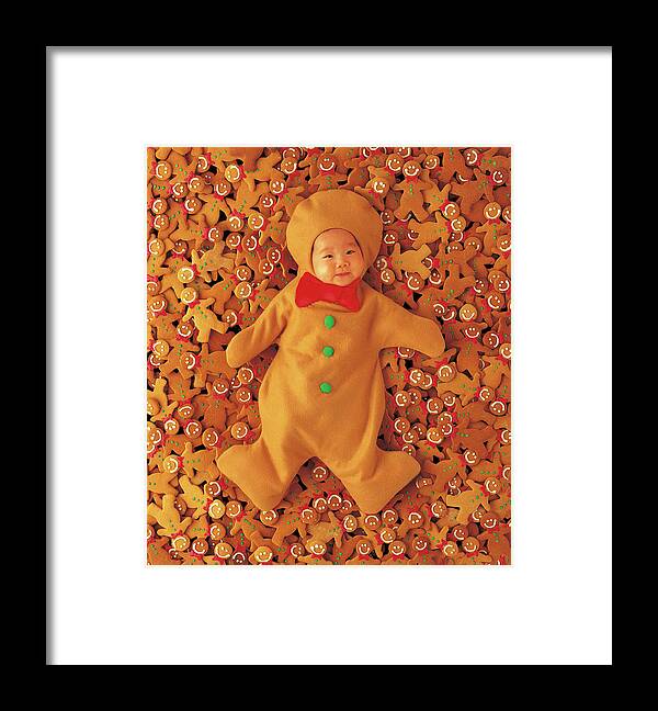 Holiday Framed Print featuring the photograph Gingerbread Baby by Anne Geddes