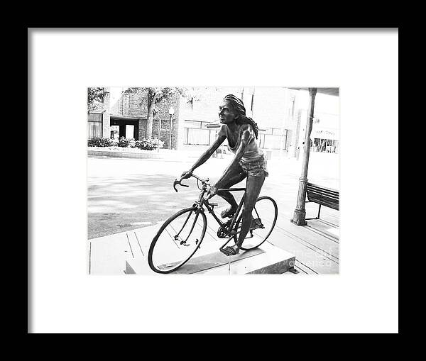 Girl On Bike Sculpture Grand Junction Framed Print featuring the photograph Girl on Bike Sculpture Grand Junction CO by Tommy Anderson