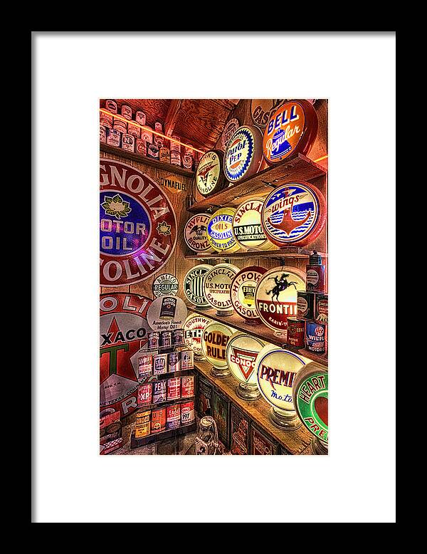 Gas Pump Globes Framed Print featuring the photograph Globes of the Past by Daniel George