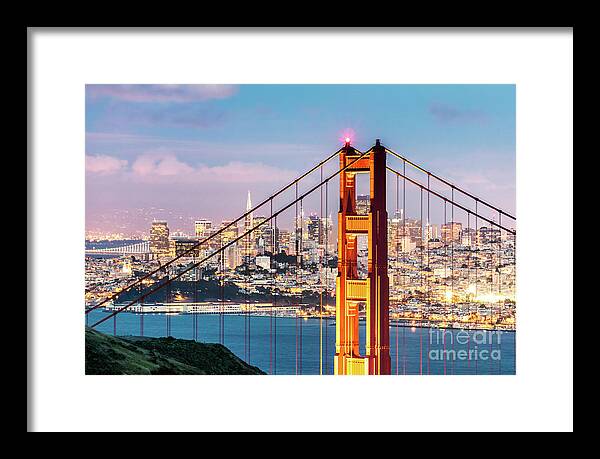Golden Gate Bridge Framed Print featuring the photograph Golden Gate bridge at dusk, San Francisco, USA by Matteo Colombo