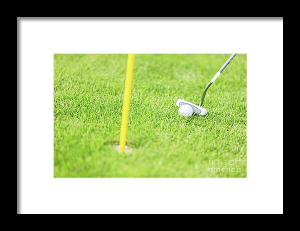 Golf Framed Print featuring the photograph Golf ball and club before hitting close up. by Michal Bednarek