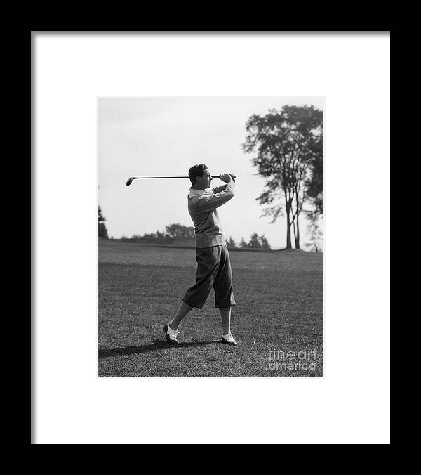 1920s Framed Print featuring the photograph Golfer Swinging Club, C.1930s by H. Armstrong Roberts/ClassicStock