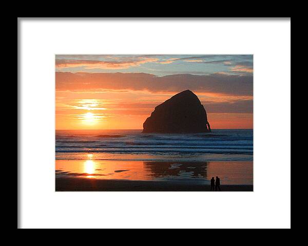 Haystack Rock Sunset Framed Print featuring the photograph Haystack Rock at Sunset by Margaret Hood