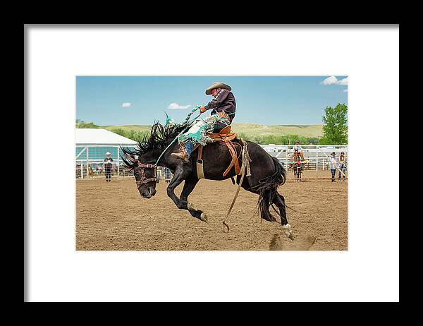 Rodeo Framed Print featuring the photograph High Ride by Todd Klassy