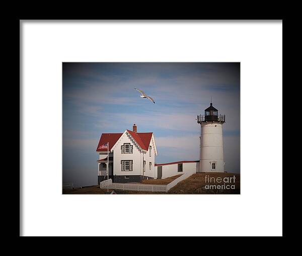 Lighthouse Framed Print featuring the photograph Highlighting the Nubble Light by Loretta Pokorny