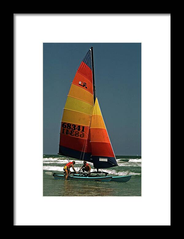 2 Men Board Small Catamaran Sailboat Framed Print featuring the photograph Hobie Cat in Surf by Sally Weigand