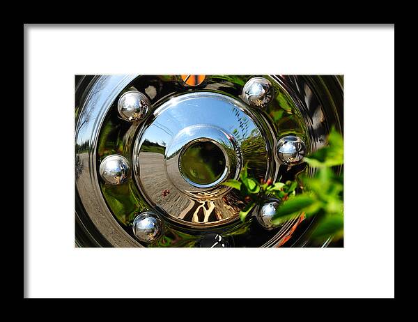 Hubcaps Framed Print featuring the photograph Hubcap Reflection by JoAnn Lense