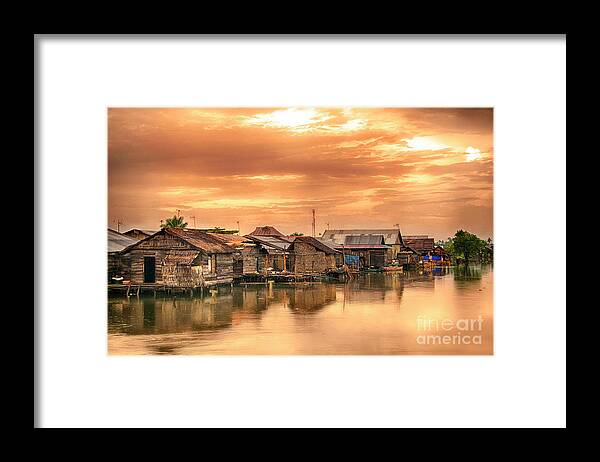 Huts Framed Print featuring the photograph Huts on Water by Charuhas Images