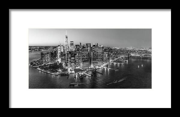 Aerial View Framed Print featuring the photograph Illuminated Lower Manhattan NYC BW by Susan Candelario