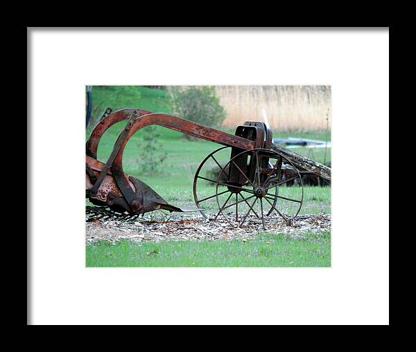 Antique Farm Equipment Framed Print featuring the photograph In The Rust Home by Wild Thing