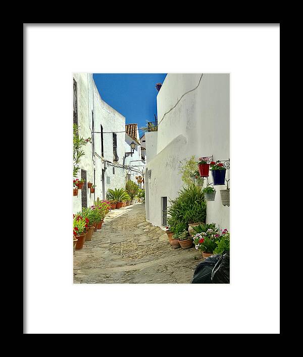 Vejer Framed Print featuring the photograph Narrow Steep Streets in Hilltop Vejer in Spain by Kenlynn Schroeder