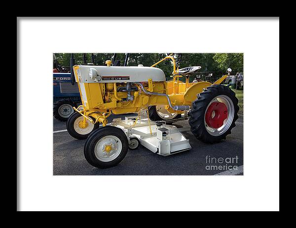 Tractor Framed Print featuring the photograph International Harvester Cub by Mike Eingle