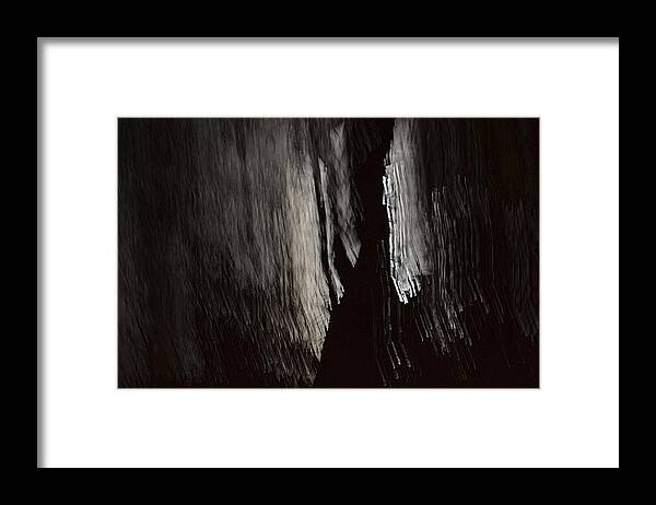 Abstract Photos Framed Print featuring the photograph Into The Dark by Nadalyn Larsen