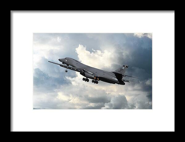 U.s. Air Force B-1b Lancer Framed Print featuring the photograph B-1B Lancer Into the Twilight by Erik Simonsen