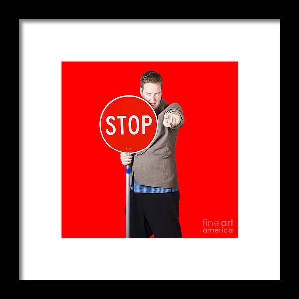 Stop Framed Print featuring the photograph Isolated man holding red traffic stop sign by Jorgo Photography