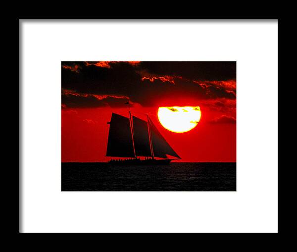Orange Framed Print featuring the photograph Key West Sunset Sail Silhouette by Bob Slitzan