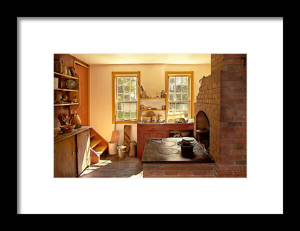 Primitive Framed Print featuring the photograph Kitchen - An 1840's Kitchen by Mike Savad
