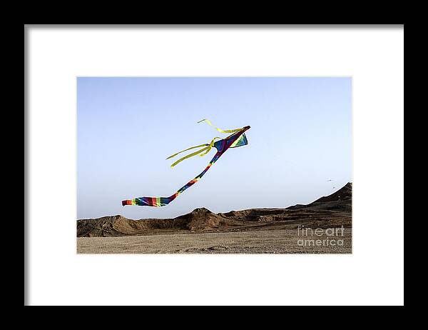 Joy Framed Print featuring the photograph Kite Dancing In Desert 03 by Arik Baltinester