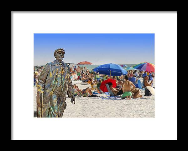 Umbrellas Framed Print featuring the photograph Lenin goes to the Beach by Larry Mulvehill