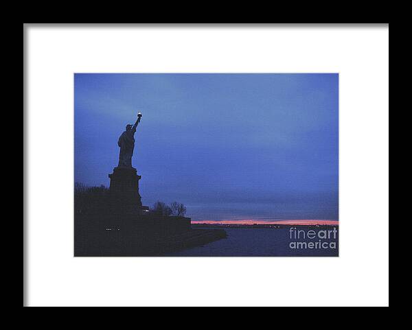 Statue Of Liberty Framed Print featuring the photograph Liberty's Light by Tom Wurl
