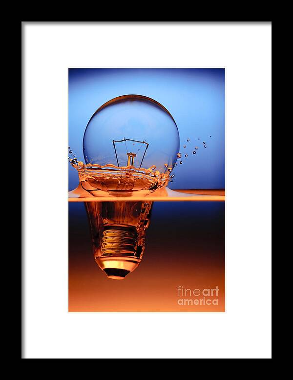 Alternative Framed Print featuring the photograph Light Bulb And Splash Water by Setsiri Silapasuwanchai