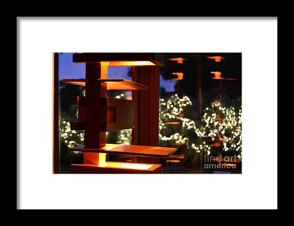 David And Gladys Wright Framed Print featuring the photograph Light Fixture Reflection in David and Gladys Wright Home by Heather Kirk