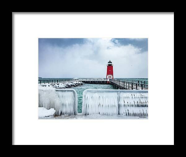  Framed Print featuring the photograph Lighthouse and Ice by Framing Places
