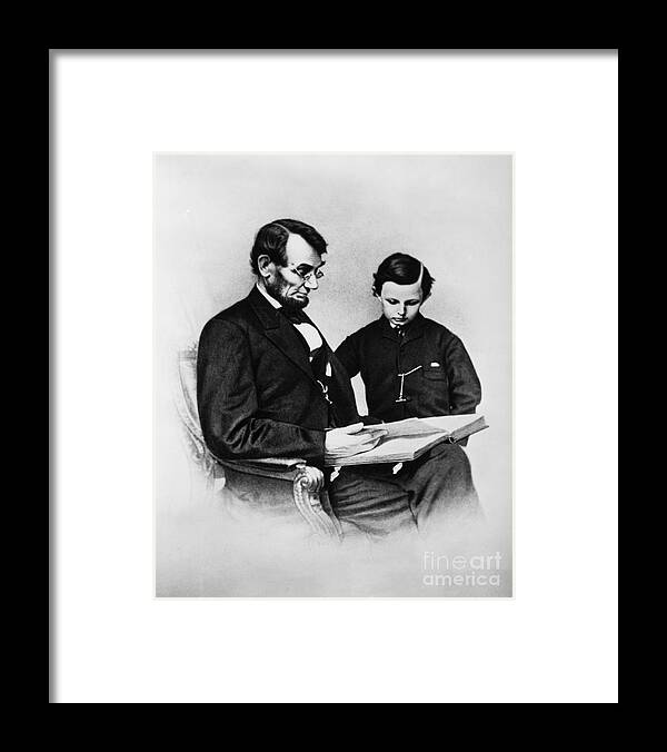 History Framed Print featuring the photograph Lincoln Reading To His Son by Photo Researchers