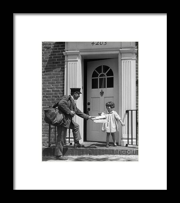 1920s Framed Print featuring the photograph Little Girl Taking Mail From Postman by H. Armstrong Roberts/ClassicStock
