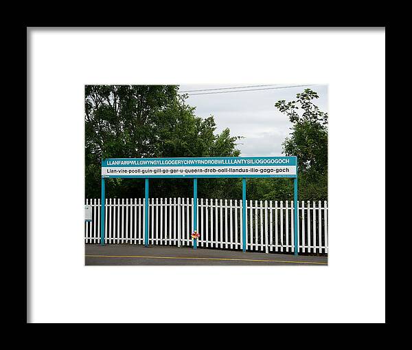 Richard Reeve Framed Print featuring the photograph Llanfairpwllgwyngyllgogerychwyrndrobwllllantysiliogogogoch Station Platform by Richard Reeve