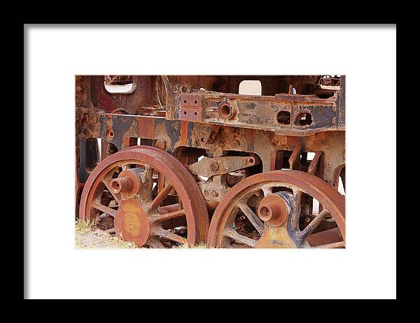 Rusty Framed Print featuring the photograph Locomotive In The Desert by Aidan Moran