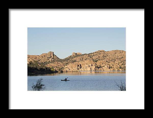 Watson Lake Framed Print featuring the photograph Lone Canoe by Laura Pratt