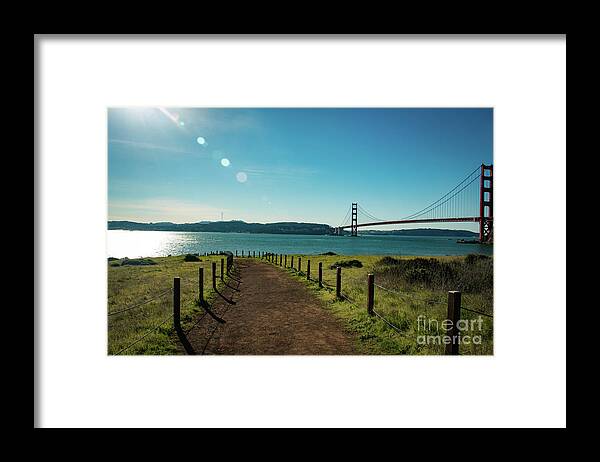 Bridge Framed Print featuring the photograph Lonely path with the golden gate bridge in the background by Amanda Mohler