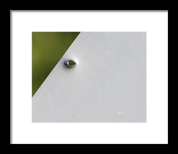 Bill Kesler Photography Framed Print featuring the photograph Bullet Hole Eye by Bill Kesler