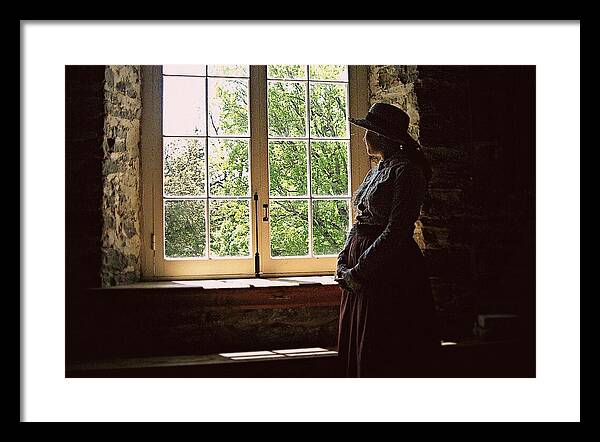 Looking Out Of The Window framed print by Tatiana Travelways