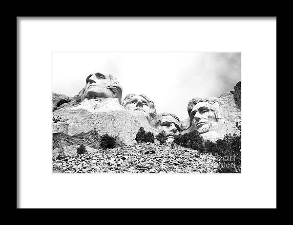 Travelpixpro Mount Rushmore Framed Print featuring the photograph Looking Up at Mount Rushmore National Monument South Dakota Black and White by Shawn O'Brien