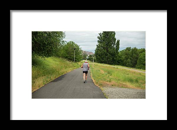 Loop Trail Runner Framed Print featuring the photograph Loop Trail Runner by Tom Cochran