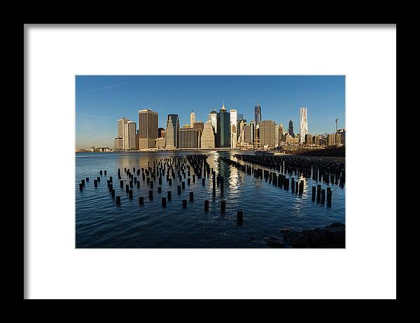 Silver And Gold Framed Print featuring the photograph Luminous Blue Silver and Gold - Manhattan Skyline and East River by Georgia Mizuleva