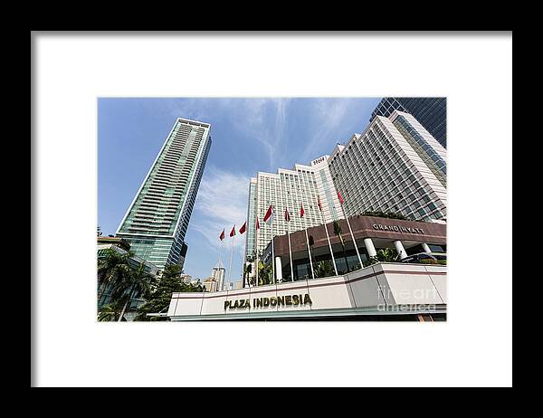 Gran Hyatt Framed Print featuring the photograph Luxury hotel in Jakarta, Indonesia capital city. by Didier Marti