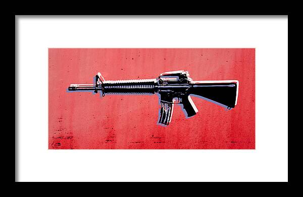 M16 Framed Print featuring the digital art M16 Assault Rifle on Red by Michael Tompsett