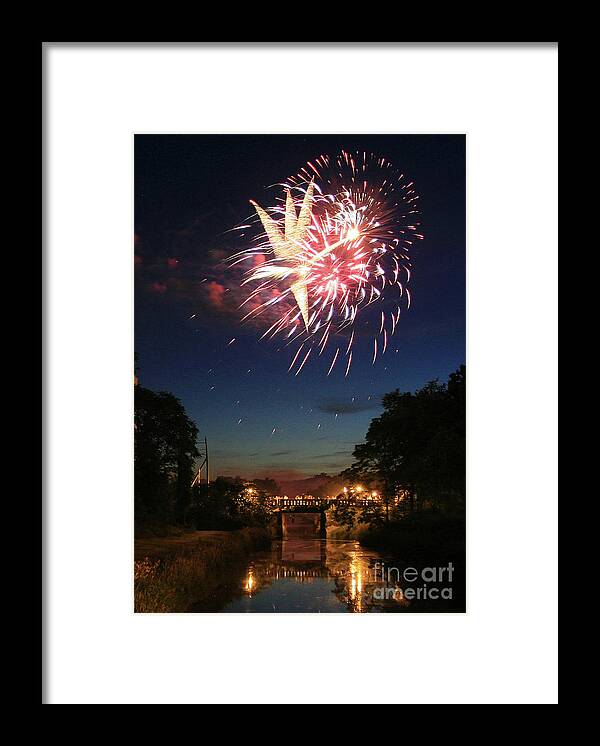 Fourth Of July Framed Print featuring the photograph Magic in the Sky by Paula Guttilla