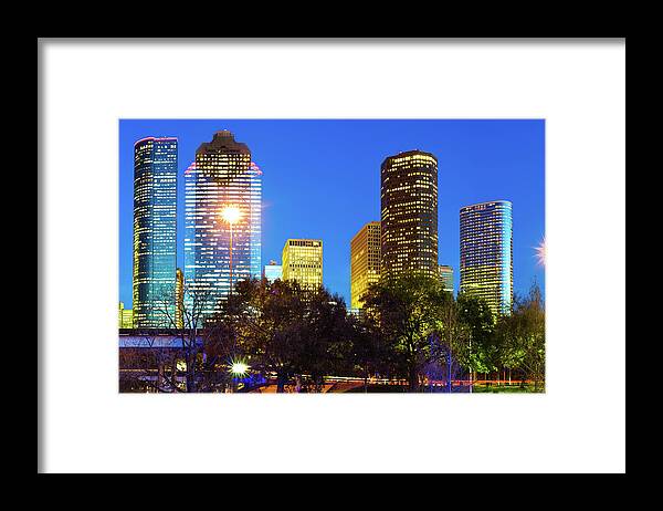 America Framed Print featuring the photograph Magnolia City at Dusk - Houston Texas Skyline by Gregory Ballos