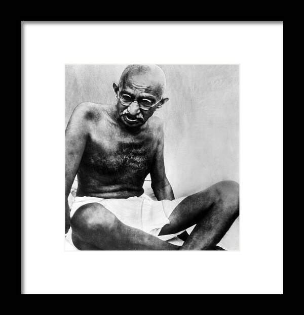 1940s Framed Print featuring the photograph Mahatma Gandhi, 78, Pauses by Everett