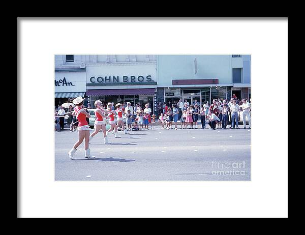 Majorettes Framed Print featuring the photograph Majorettes marching on Congress Avenue during downtown Austin Parade by Dan Herron