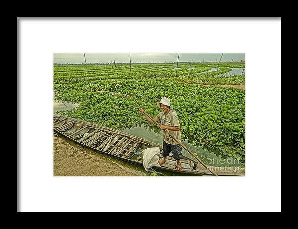 Landscape Framed Print featuring the photograph Man of daily life by Arik S Mintorogo