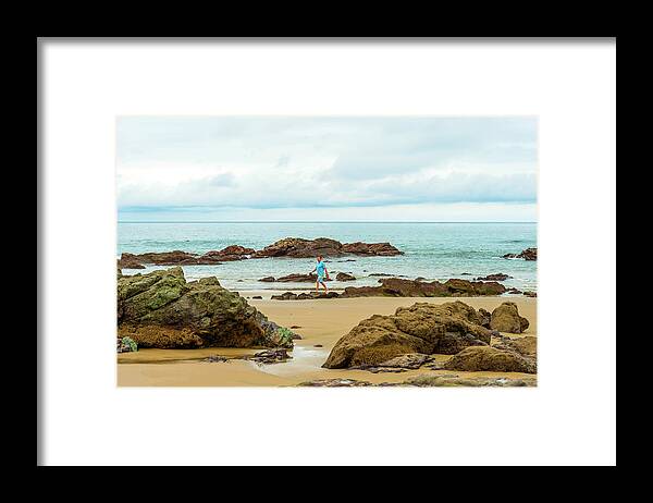 Beach Framed Print featuring the photograph Man on the beach in Pedasi, Panama. by Marek Poplawski